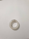 Bague en résine époxy blanche avec paillettes argentées