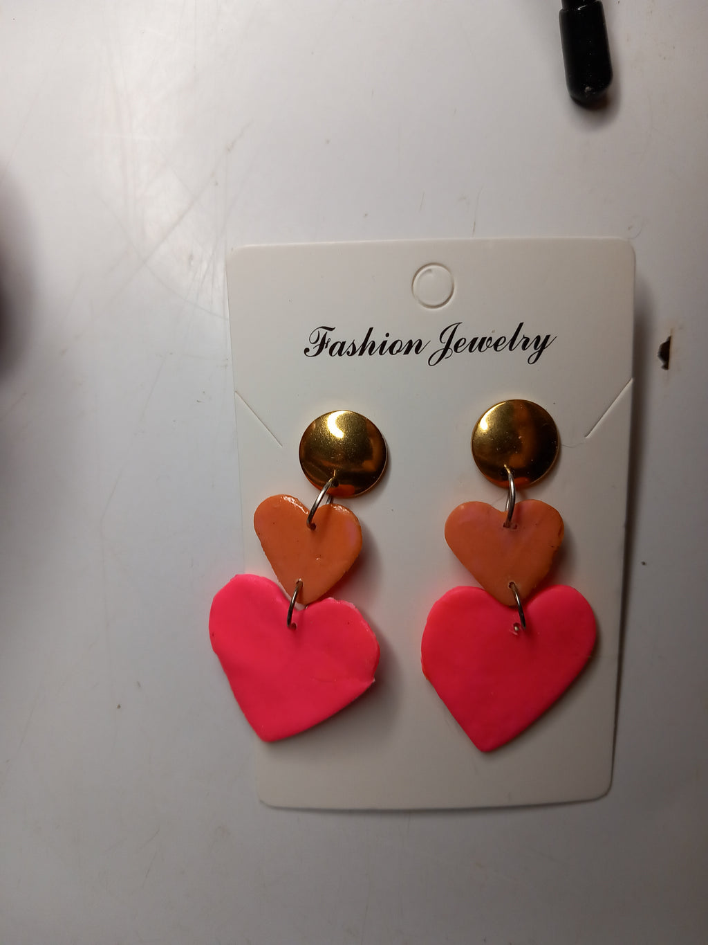 Boucles d'oreilles pendantes goutte résine époxy rose clair et fuchsia plaquées or