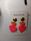 Boucles d'oreilles pendantes goutte résine époxy rose clair et fuchsia plaquées or