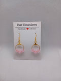 Boucles d'oreilles créoles plaquées or avec perles rose