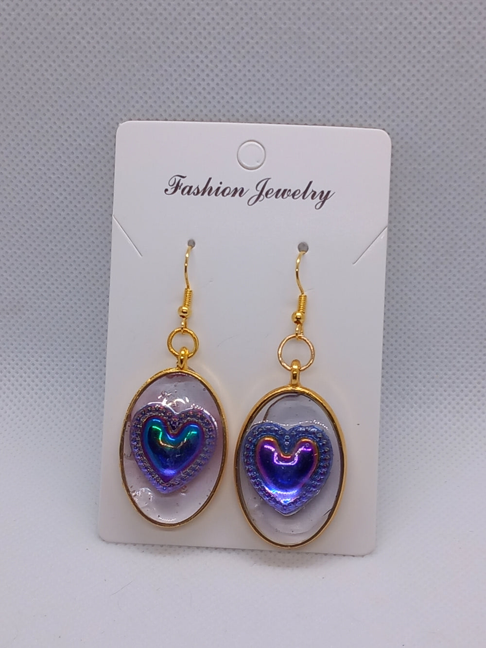 Boucles d'oreilles pendantes ovale résine époxy cœur violet plaquées or
